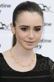 th_67660_celeb-city.org-The_Elder-Lily_Collins_2009-07-09_-_The_Serpentine_Gallery_summer_party_597_122_135lo.jpg