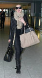 th_19937_celebrity-paradise.com-The_Elder-Kate_Winslet_2010-02-22_-_Heathrow_Airport_088_122_418lo.jpg
