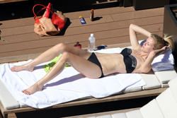 http://img133.imagevenue.com/loc519/th_106436580_BrooklynDecker_BikiniSydney_April8_2012_37_122_519lo.jpg