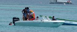 th_380757978_RihannaenjoysafunridewithfriendsonaboatinBarbados_128_122_569lo.jpg
