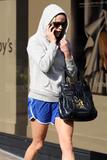 Reese Witherspoon Th_73701_Preppie_-_Reese_Witherspoon_tries_to_hide_from_photographers_while_leaving_a_building_in_Beverly_Hills_-_Nov._13_2009_519_122_769lo