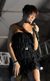 Rihanna leggy in short black dress performs at the 3rd Thisday Africa Rising Festival in Abuja, Nigeria